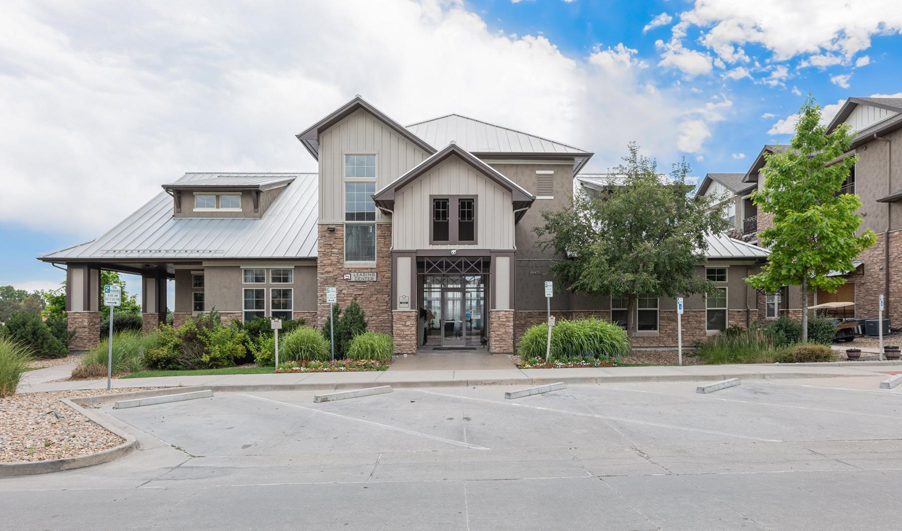 a large house with a parking lot
