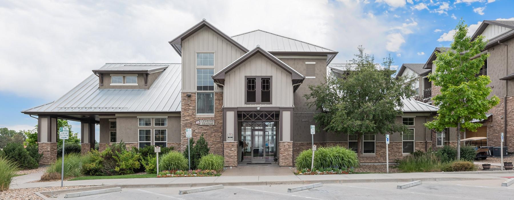 a large house with a parking lot