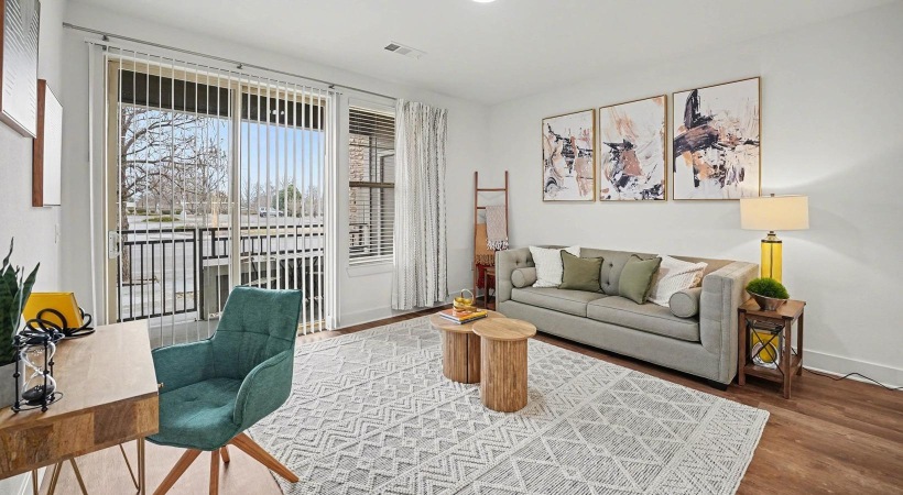 a living room with a couch and a table